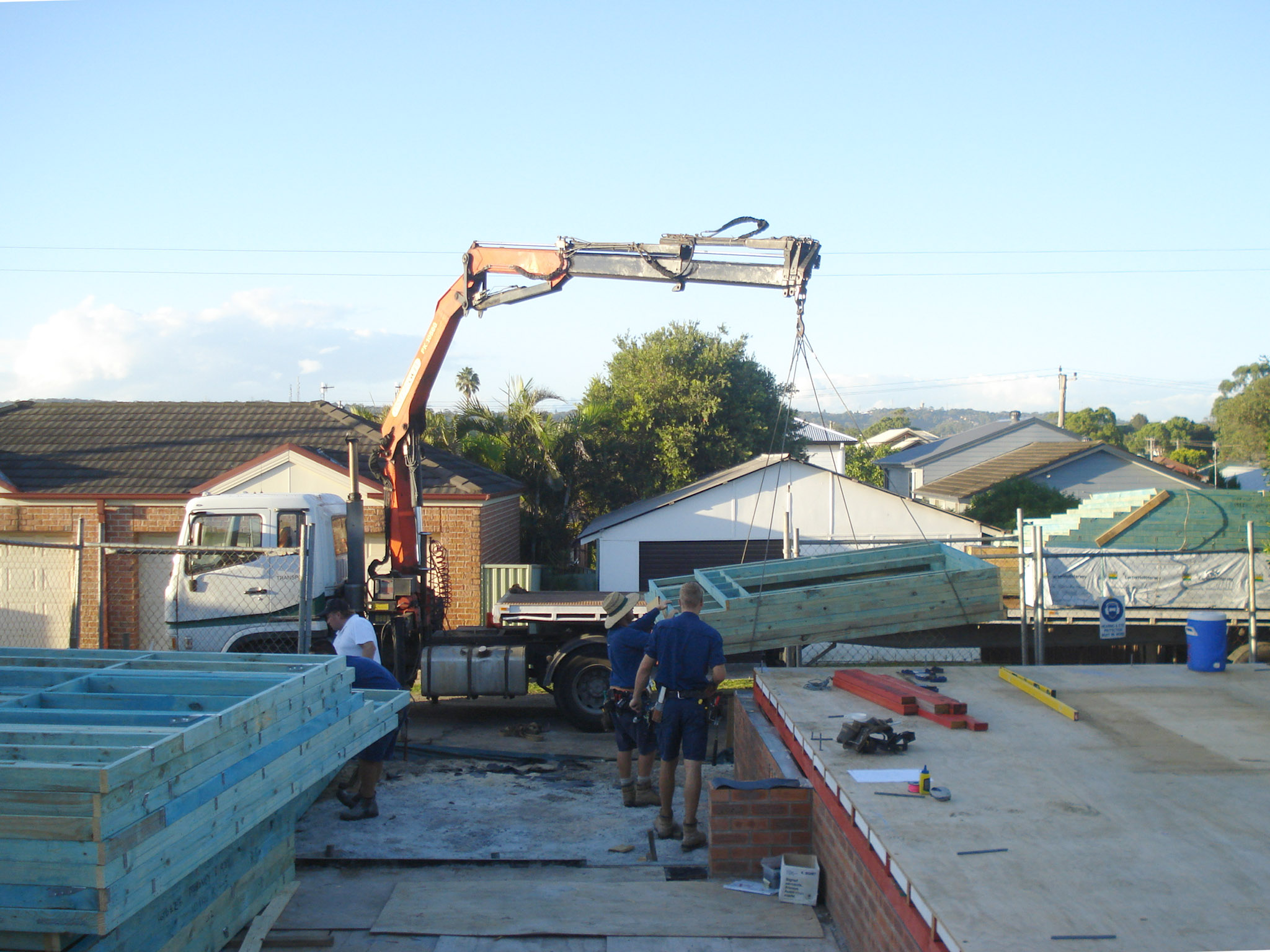 Buildingwise 207a Lambton Road New Lambton New Framework Getting Loaded by crane from flatbed truck to construction site